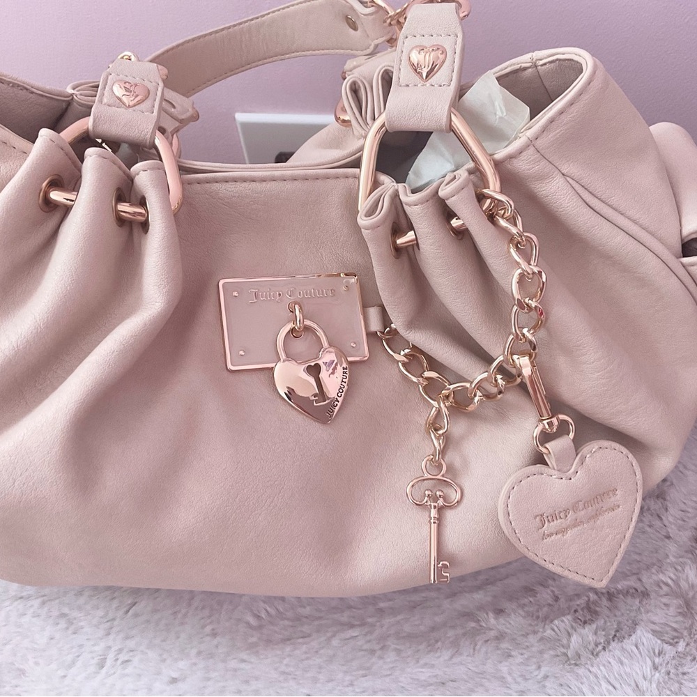 Juicy Couture rolling on satchel and mini barrel bag